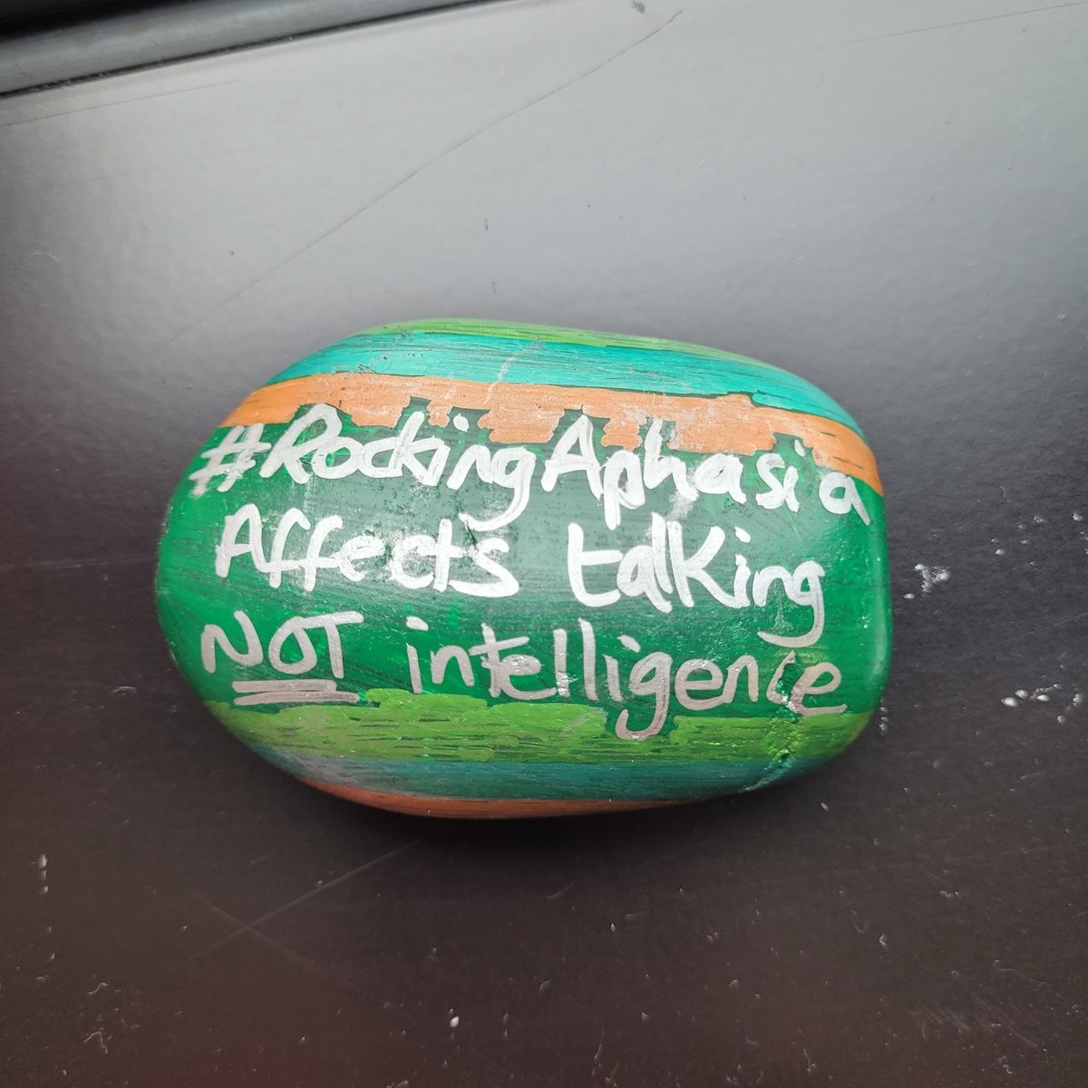 CHartleySLT's tweet photo. Another day on campus......another #rockingaphasia stone for @MyBCU and @BCUHELS staff and students to find. 
Quote from one of our conversation group members about what it is like to have aphasia. #Edgbaston 
Great to see @KellyFogarty14 also leaving a stone today! https://t.co/39W4iGDNgD