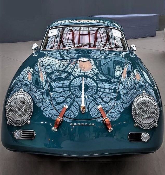 BurtonPixels's tweet image. I ❤️ the reflections on this Porsche, not to mention the fact that the hood lid over the engine is held on via belts. 

I also like the metal grill over the headlights. 

And the color. The color is frickin’ gorgeous. #CarNerd