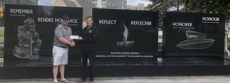 MPFFA Secretary/Treasurer Chris Perry presents a cheque to Rob Campbell, President of the Manitoba Fallen Firefighters Foundation in the amount of $8500 on behalf of all Manitoba Locals and their members.