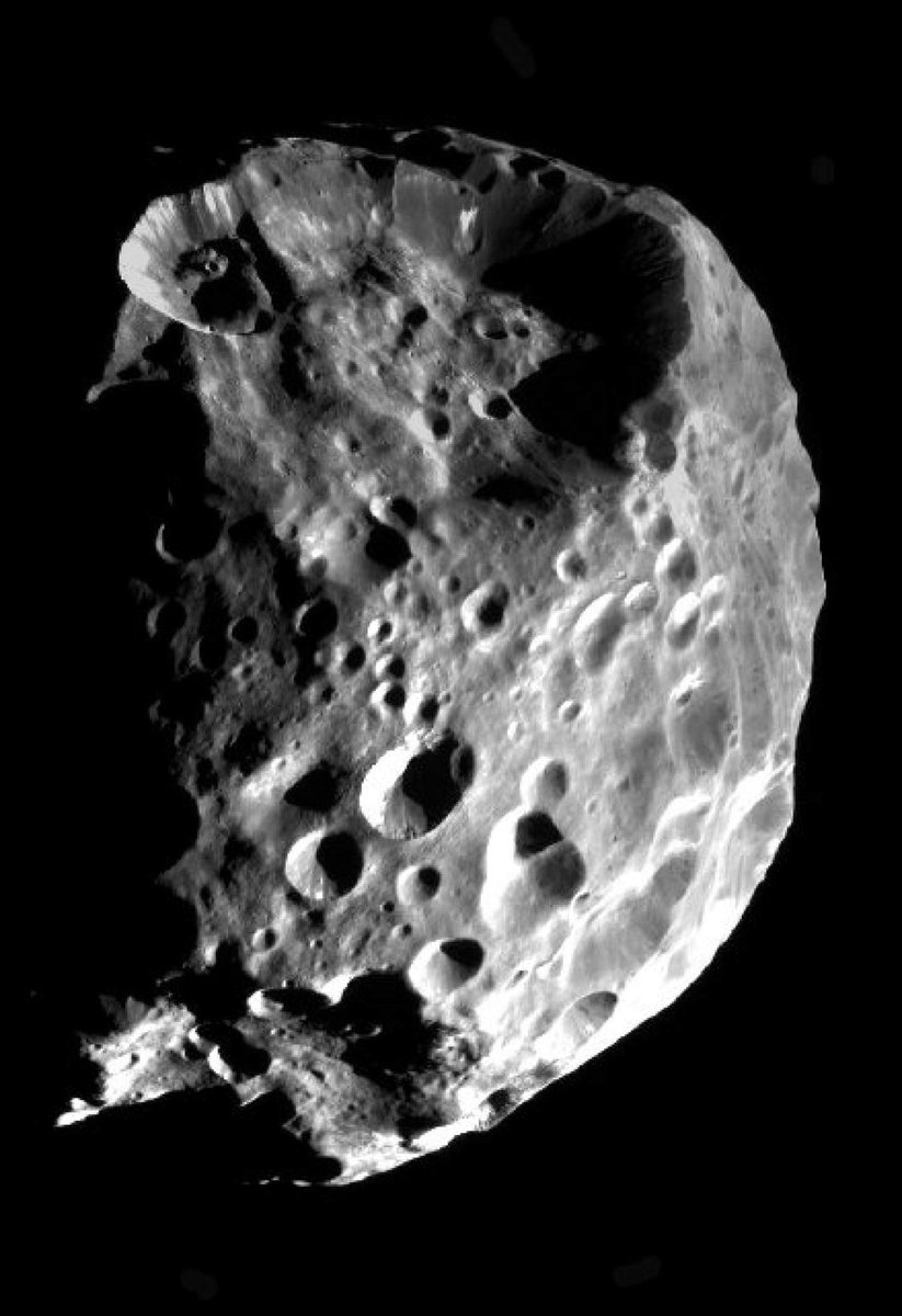 airandspace's tweet image. #OTD in 2004, the Cassini spacecraft made a flyby of Saturn's moon Phoebe, capturing two images that make up this mosaic.