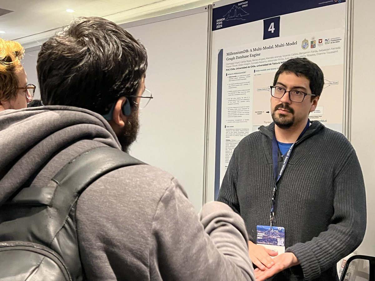 IMFDChile's tweet image. 📌Seguimos en las Demo Sessions en #SIGMOD2024: Ahora Carlos Rojas, ingeniero IMFD, y Benjamín Farías, @dccuc, presentan MillenniumDB, un motor de bases de datos de grafos open-source, que trabaja con múltiples modelos de datos y lenguajes de consulta.