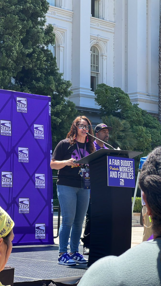 We’re the 5th largest economy, we have more billionaires than any other state. Yet social , healthcare, childcare, &amp; state workers have had to fight deep cuts to the people we care for, the programs we run, &amp;  our personal budgets at home.”- Anica Walls <a href="/SEIU1000/">SEIU Local 1000</a> President Elect