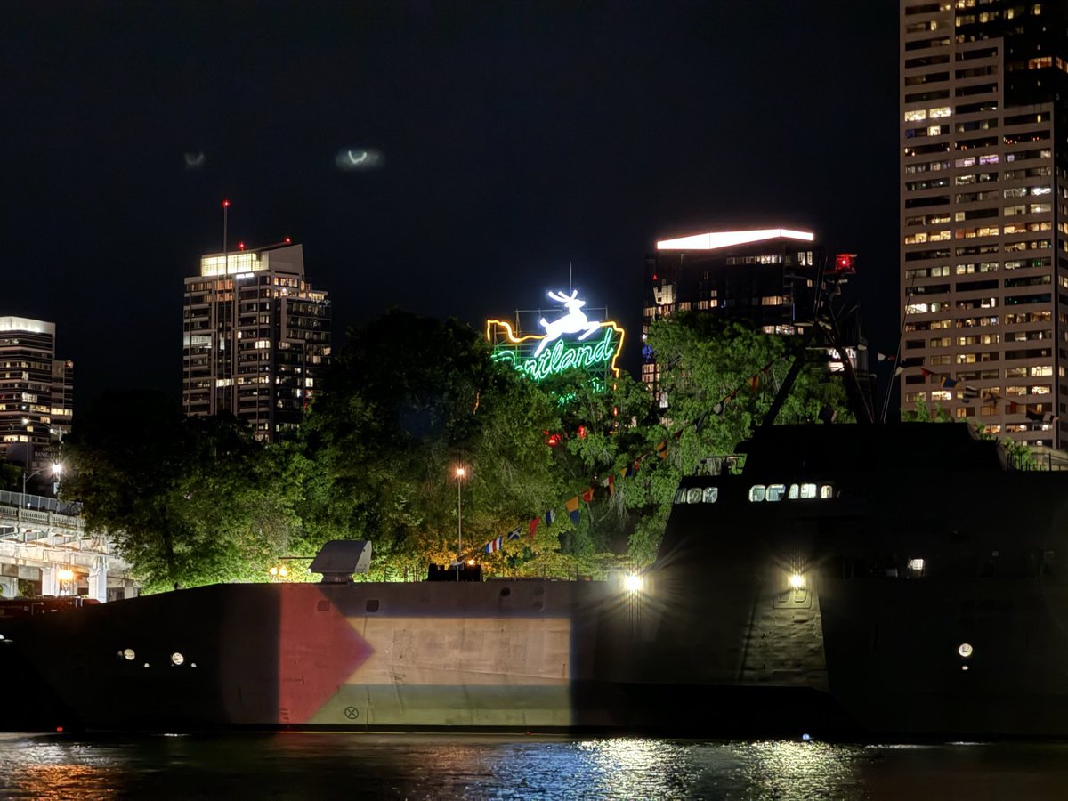 MikePrysner's tweet image. US Navy warship docked in Portland for “Fleet Week” hit with the projector gun by a group of veterans 🫡