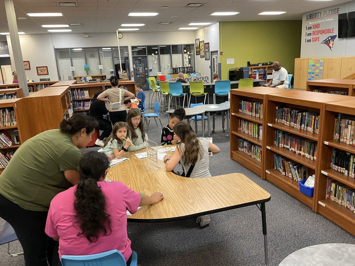 Liberty_D135's tweet photo. Families worked together to challenge their brains through various puzzle challenges this morning at our first summer series of the summer. Great to see so many families attend!!! #osd135 #libpride https://t.co/31QJ15zCAQ