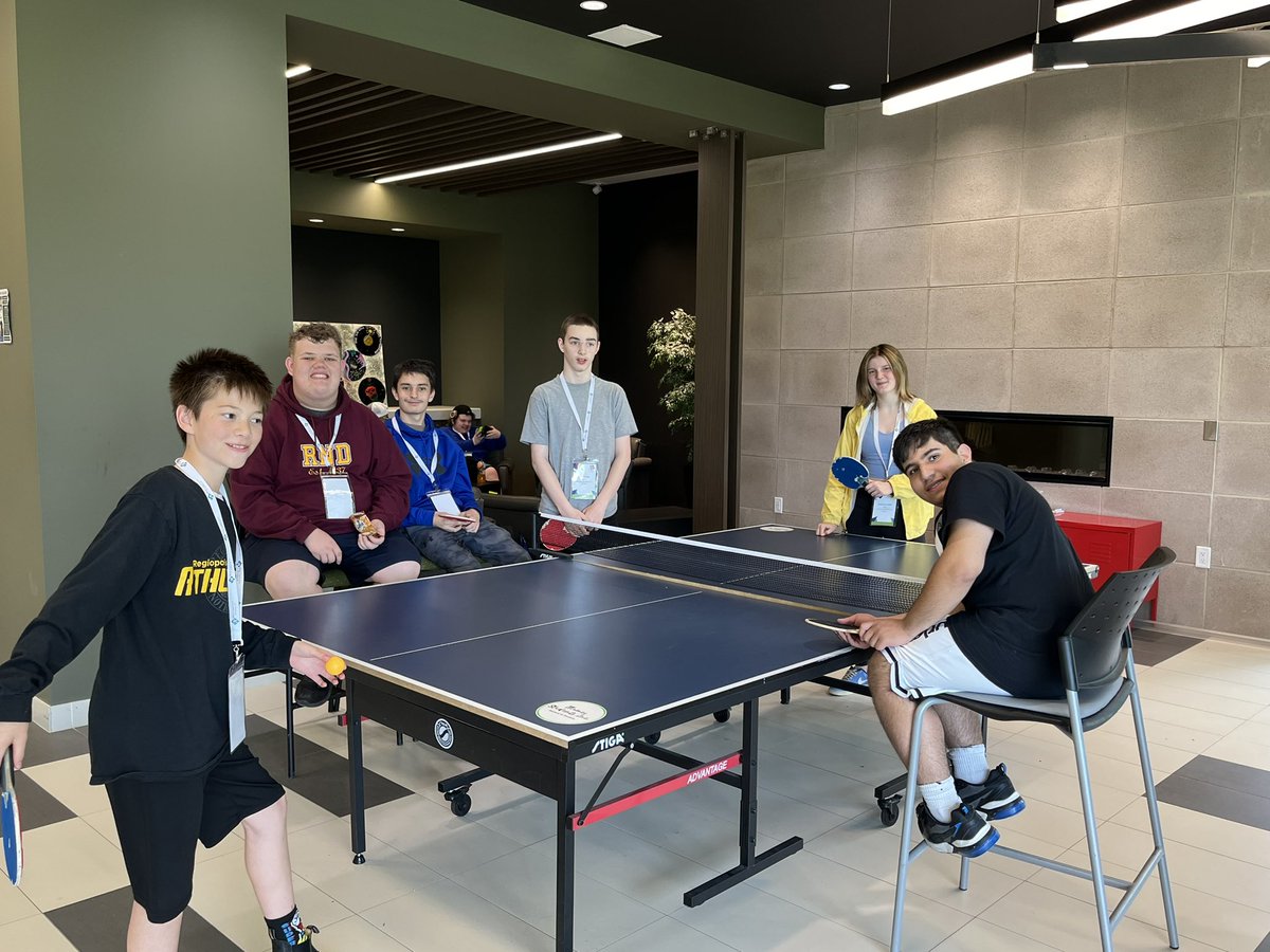 RegiNotreDame's tweet photo. The RND floorball team competing at the provincial championships … and practicing a little ping pong on the side. https://t.co/Y01laCknPz