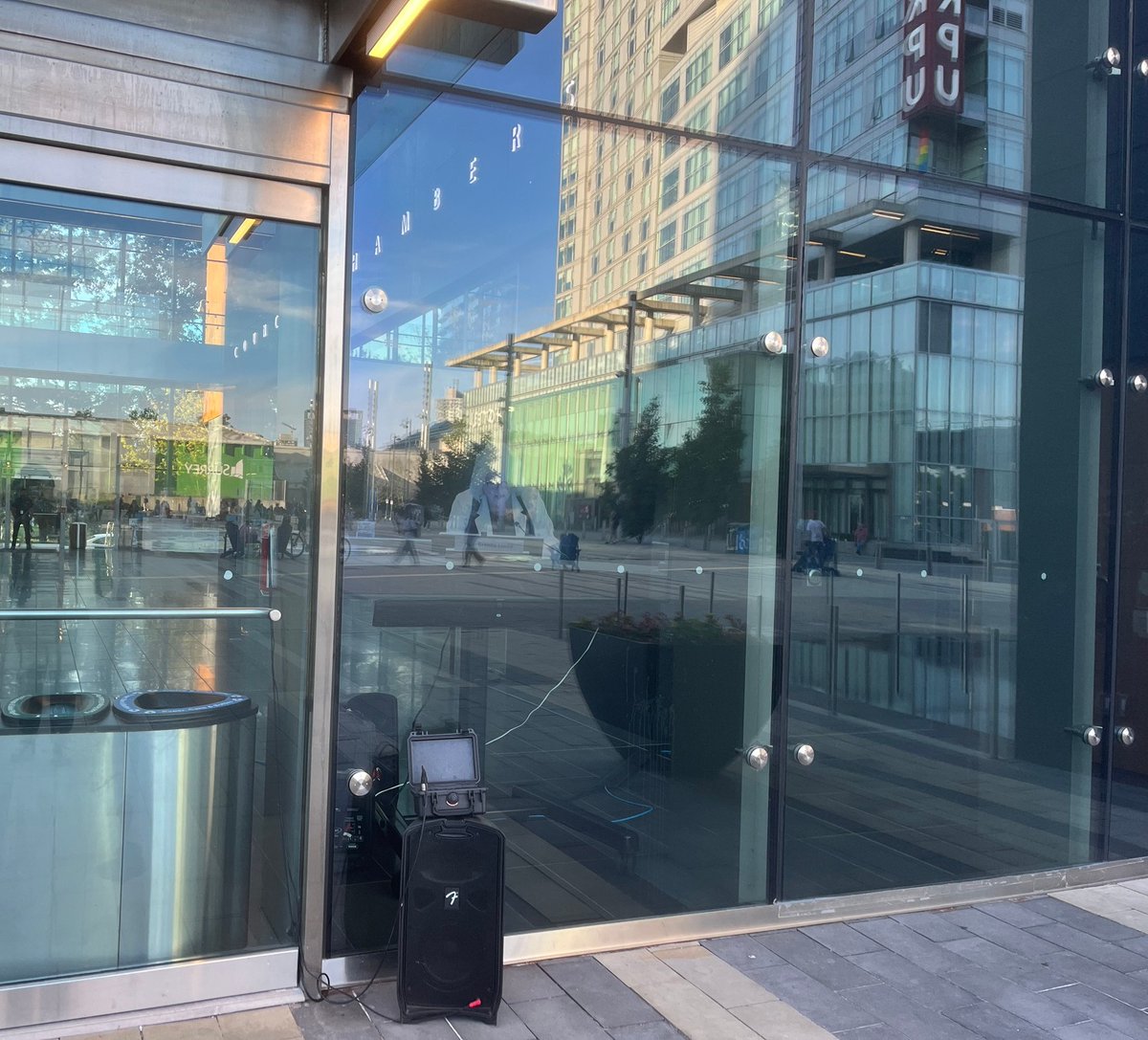 BC_ACORN's tweet photo. Does this look like democracy to you?

This is how Elizabeth Manor tenants will watch Surrey Council vote on their demovictions on June 24th, online or standing on hot concrete behind glass, straining to hear over Skytrain noise. Security and the RCMP guard the doors. (1/2) https://t.co/5ufjccEXd1