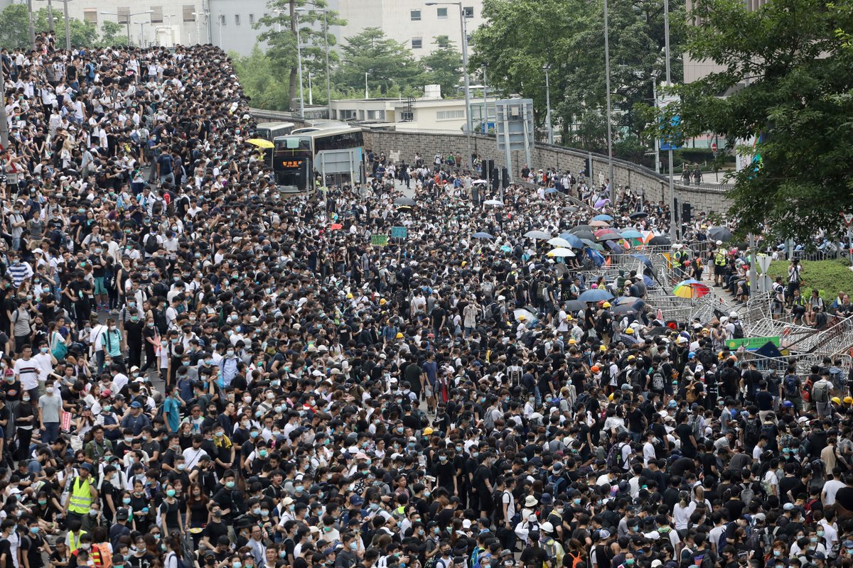 RadioFreeAsia's tweet photo. Five years ago this month, more than 1 million residents took to the streets toprotest a plan to extradite Hong Kongers to mainland China. 

📷: AFP, Reuters https://t.co/IFpb6aeeAH