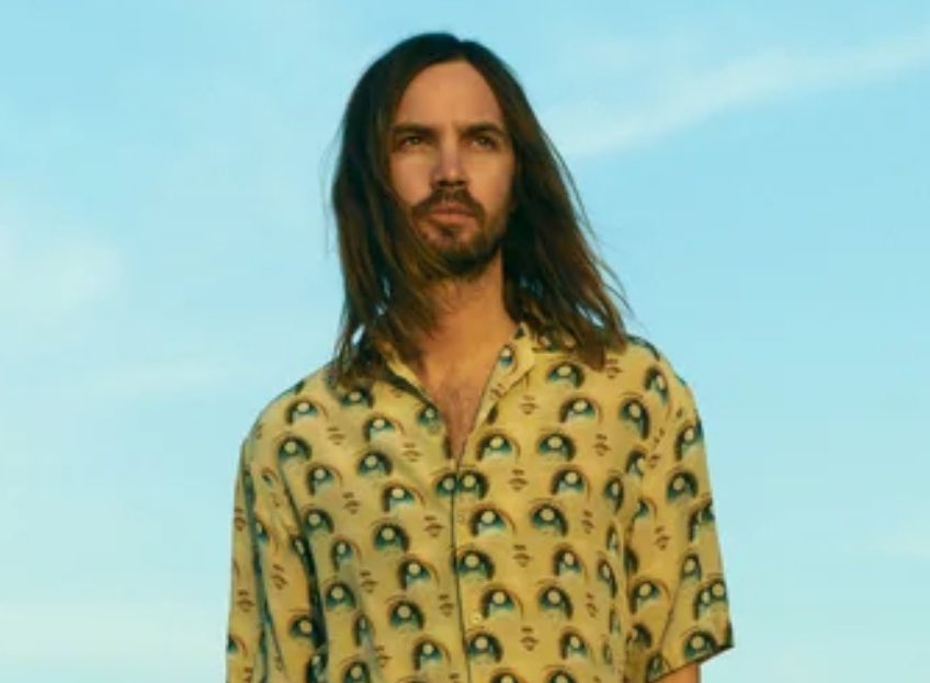 Dude trying to take tame impalas look smh