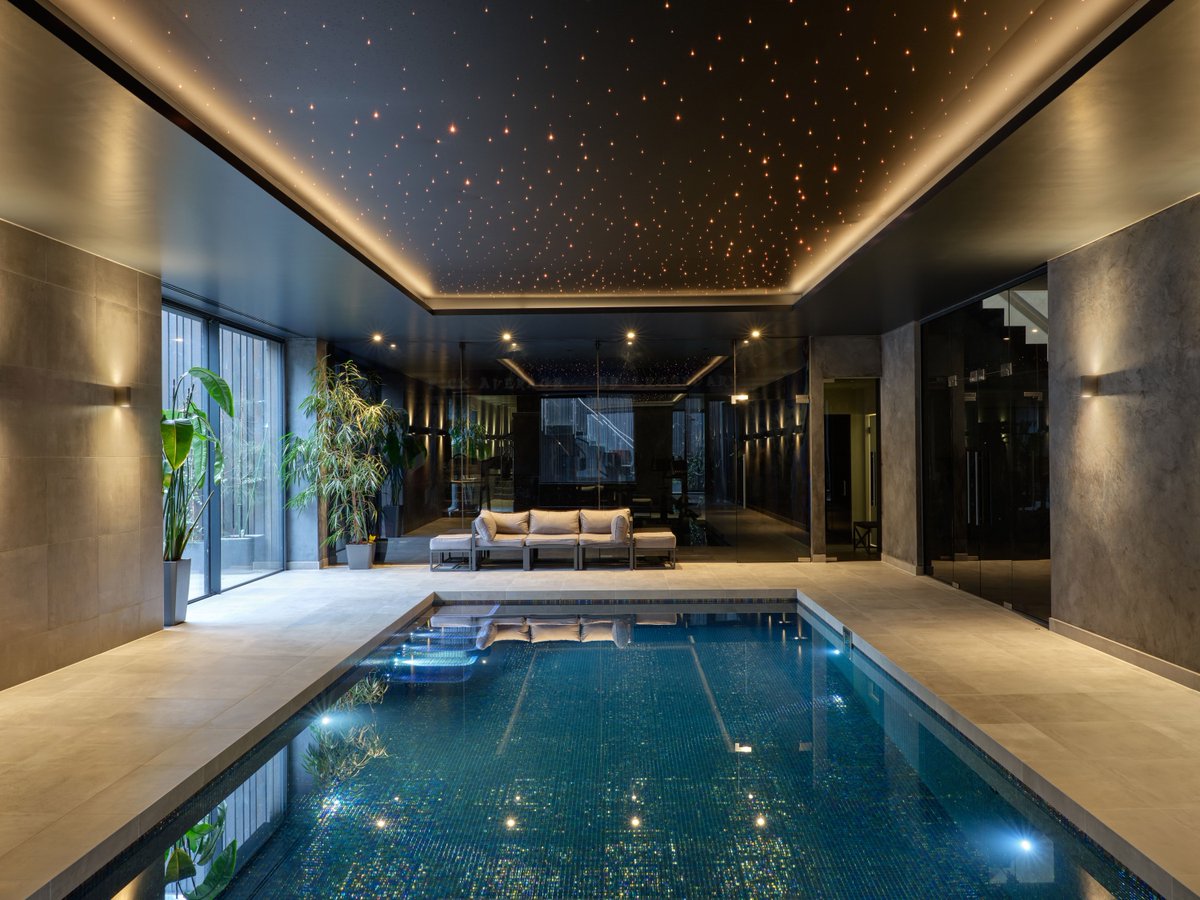 KINGSWOOD HOUSE.
Imagine having a dedicated 'entertainment' level in your home—your exclusive oasis of relaxation. Dive into a dream of #HomeEscape, swimming in an #LuxuryIndoorPool. #DreamHome #ArchitectureLovers #InteriorArchitecture