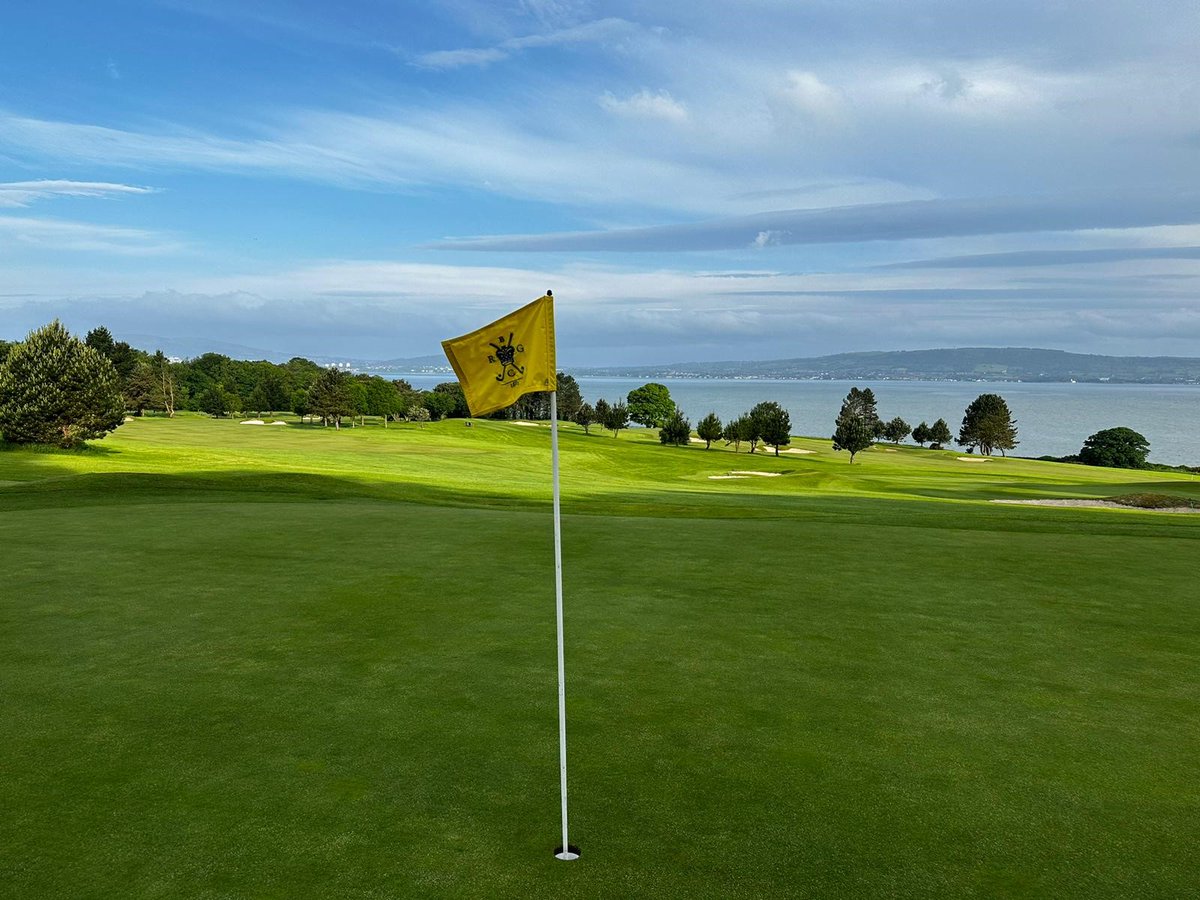 royalbelfast's tweet photo. When playing at Royal Belfast you will notice 3 different coloured flags on the greens... Red is for frontal pin position, yellow is middle and blue will require a shot to the rear segment of the greens. #golfflags #pinpositions #nigolf https://t.co/GxWmCNd2Nr