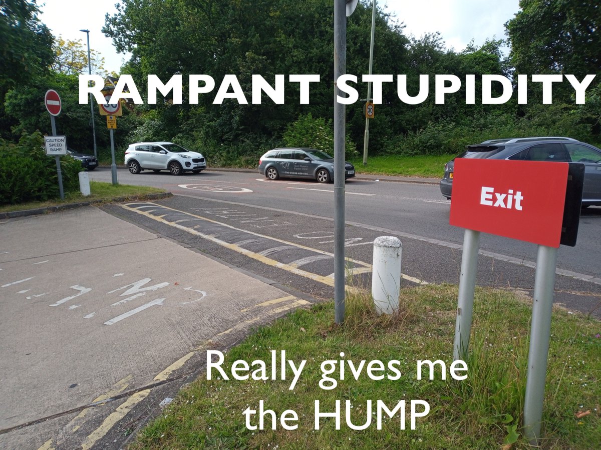 This is the exit (only) from a Texaco fuel station.  The speed ramp is placed 5 feet away from the road you're joining.   Come on, are you morons?   Sadly this is common, the assault on common sense is beyond words.