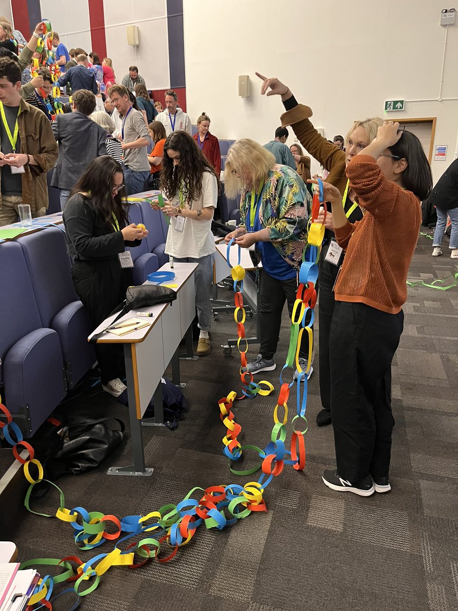 Some shots of yesterday’s chaotic paper chain challenge at #uxlibs. Won by Team A A Milne.
