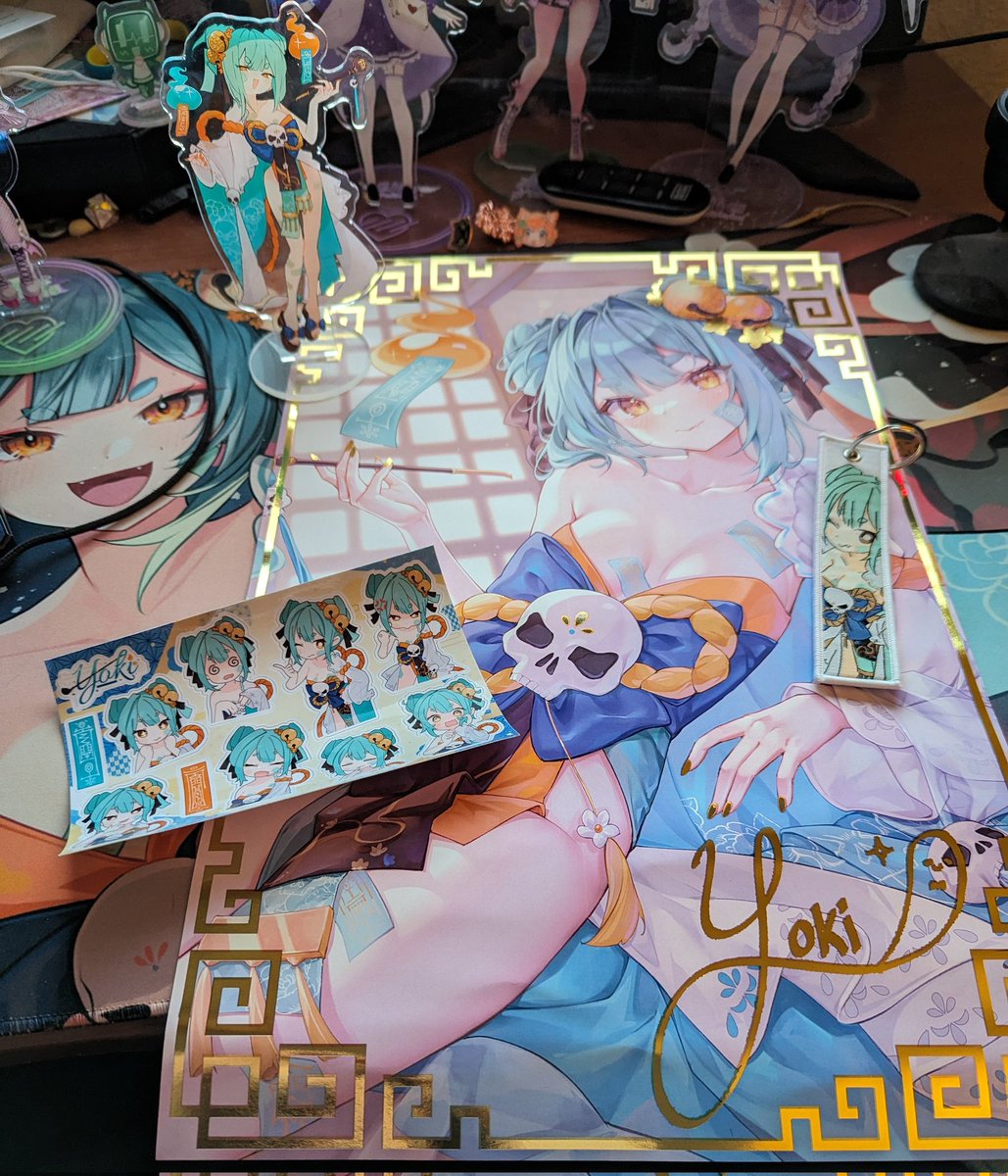 Alazais4's tweet photo. My yoki merch arrived, so I took a picture of it on top of more Yoki merch so my Yoki merch would have some good company. #InamiYoki https://t.co/KjsHIilOpy