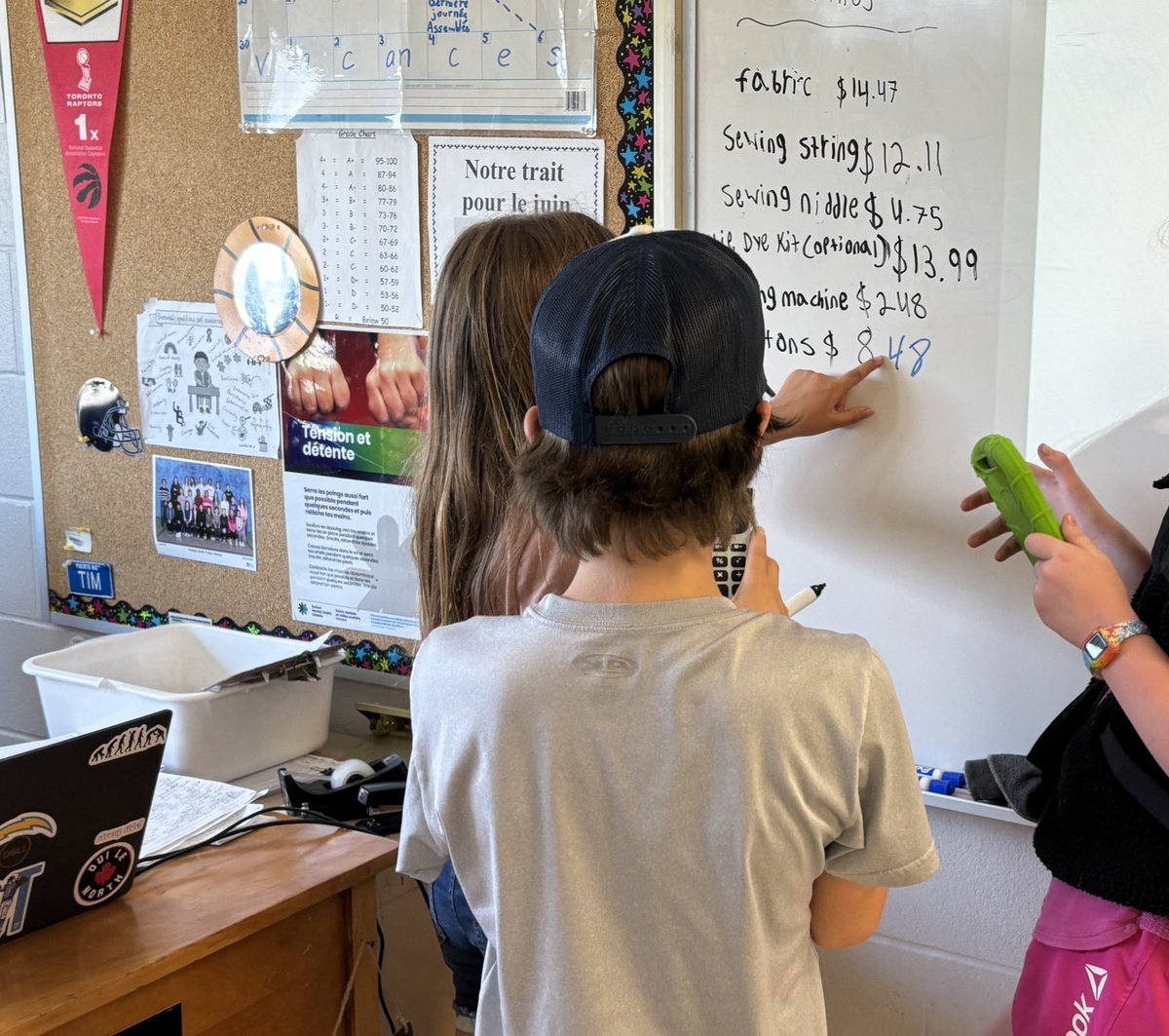 Working in groups on a financial literacy word problem! These groups determined what they wanted to create, found their own materials online, and used the subtotals to determine taxes and totals. <a href="/ArdaghBluffsPS/">Ardagh Bluffs Public School</a>