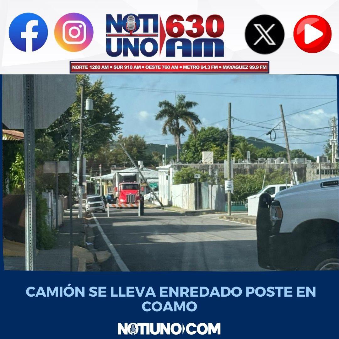 NotiUno's tweet photo. Mientras los apagones continúan, camión se lleva enredado cables del tendido eléctrico en la Carretera 150 al lado de la Escuela de Bellas Artes José Quintón en Coamo. @lumaenergypr https://t.co/RpZVsJBb4u