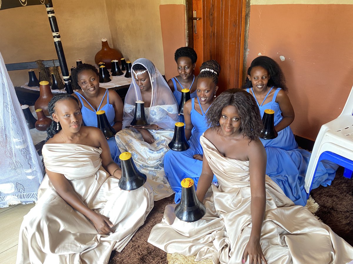 Ladies of western Uganda proudly holding traditional milk pots, embodying the region’s rich cultural heritage and the importance of milk in their daily lives. 

These wooden vessels that look like pots are traditionally called “EBYANZI” which are used for serving and storing milk