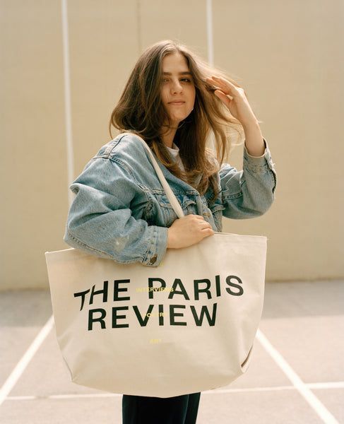 parisreview's tweet photo. The Review’s largest bag to date, the weekender has room for all your travel essentials, books, and magazines.

Shop now. https://t.co/bhls96f0nB https://t.co/hmIBEr0Gjm