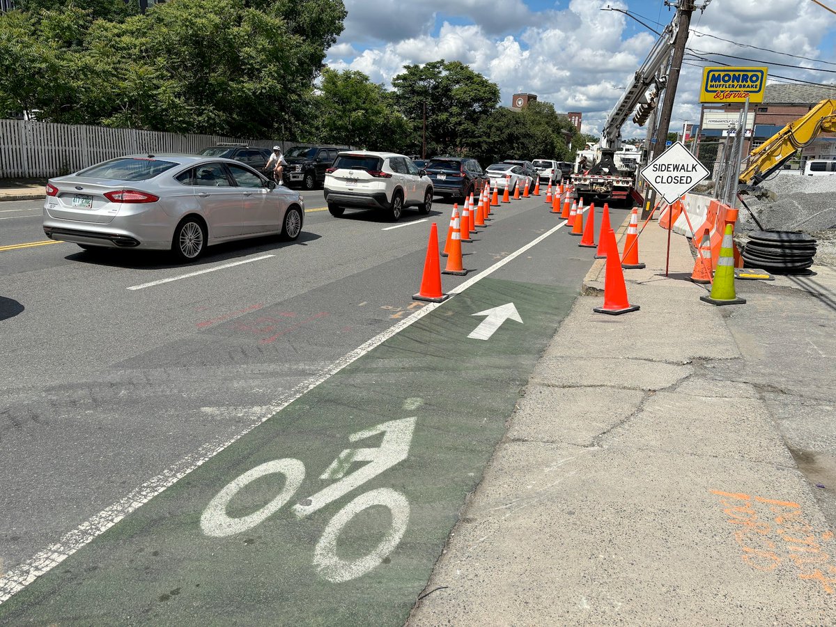 Dustin_Michels's tweet photo. Wow, cone bike path makes me feel so loved!! I told the @EversourceMA worker so, and he said, "I'll set it up for you tomorrow, too!" https://t.co/vXhvXPBA56