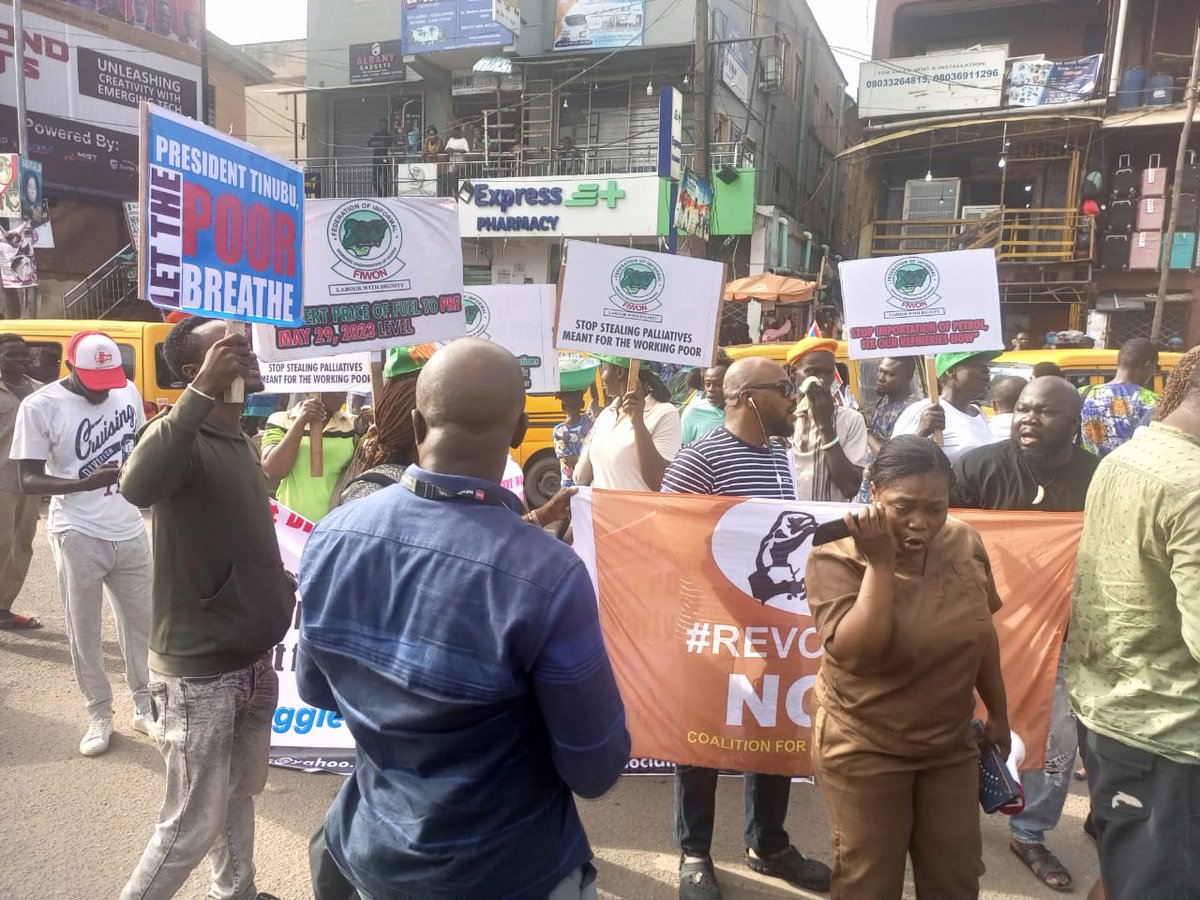 Newly elected Chairperson of Lagos Chapter of FIWON (in red, on the left) takes a lead in the anti hunger protests in Lagos today...