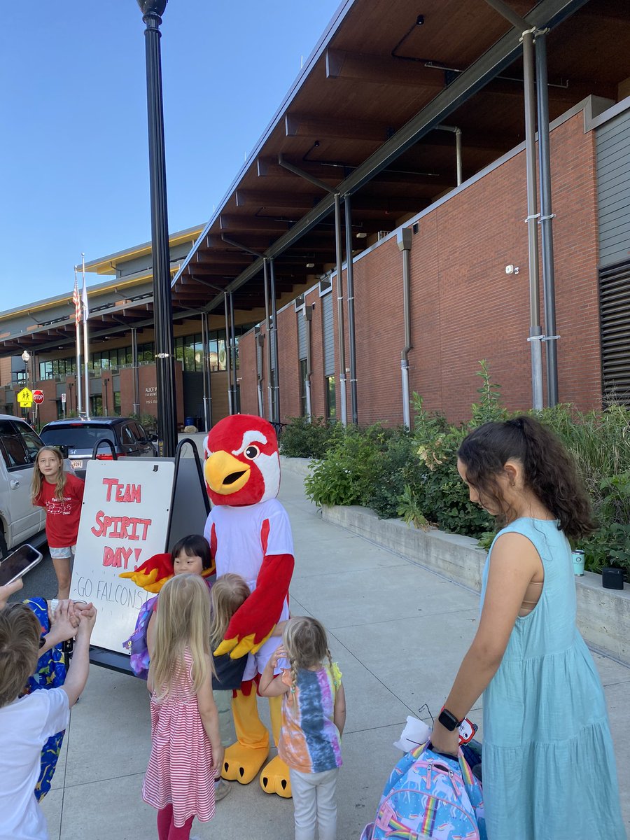 Flash the Falcon greeting students this morning for Team Spirit Day! ♥️✨
