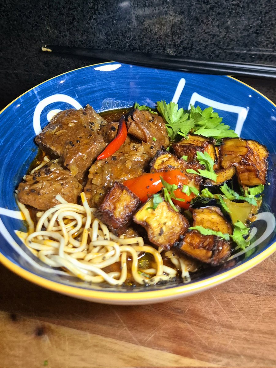 MphoMasoleng's tweet photo. Spicy beef short ribs noodle soup &amp; fried egg plant 😋😊👌 in my  new ramen dishe🤸‍♀️ 😁, Do you like?  #MunchWithMpho https://t.co/n965rsF1Dq