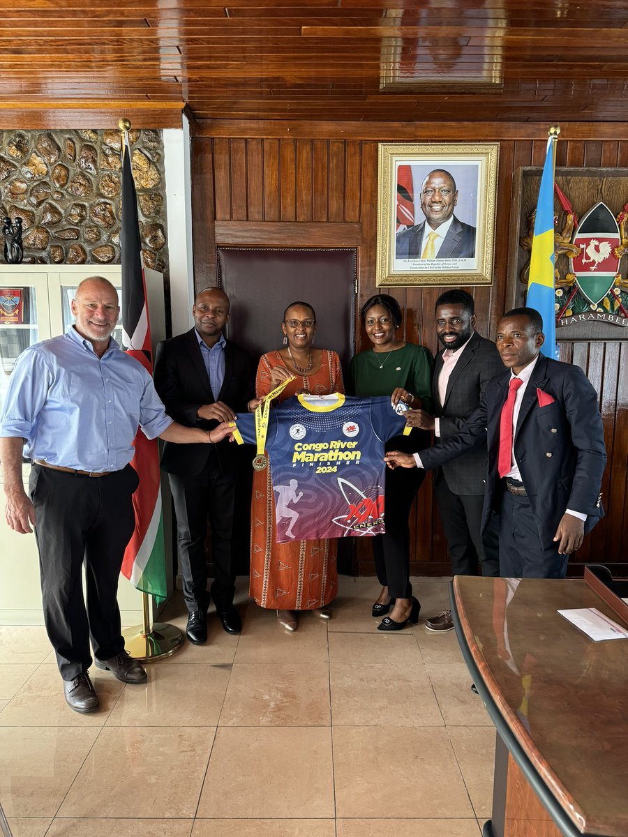 congomarathon's tweet photo. La Fondation Congo River Marathon s’est rendue à @KENYAinDRC pour remettre les médailles et les prix des deux athlètes kenyans exceptionnels : Kennedy Lilian, le recordman masculin du parcours du 42 km, et Jane Jerono Rotich, 3ème dans la category dame pour le 42K. https://t.co/FSKSDR5DFV