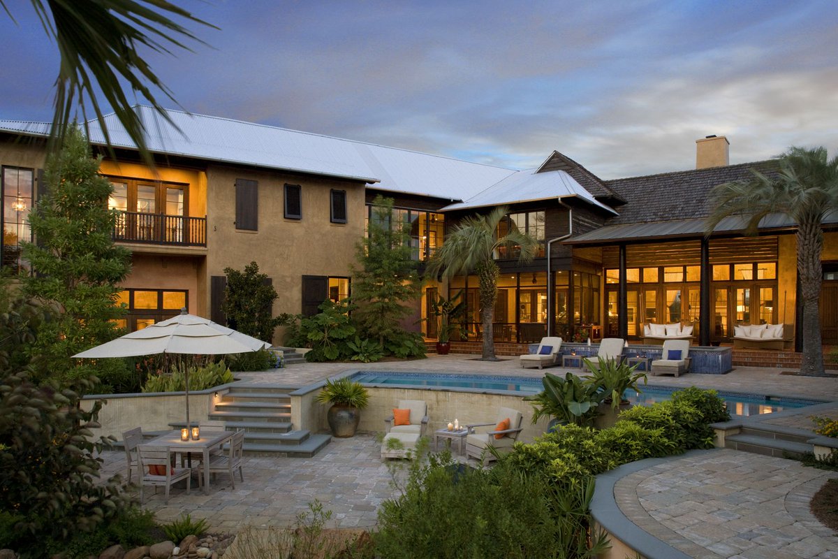 Embracing the serenity of the Florida panhandle, this custom home blends Italian and Moroccan architecture to create a private oasis without leaving the comfort of home.