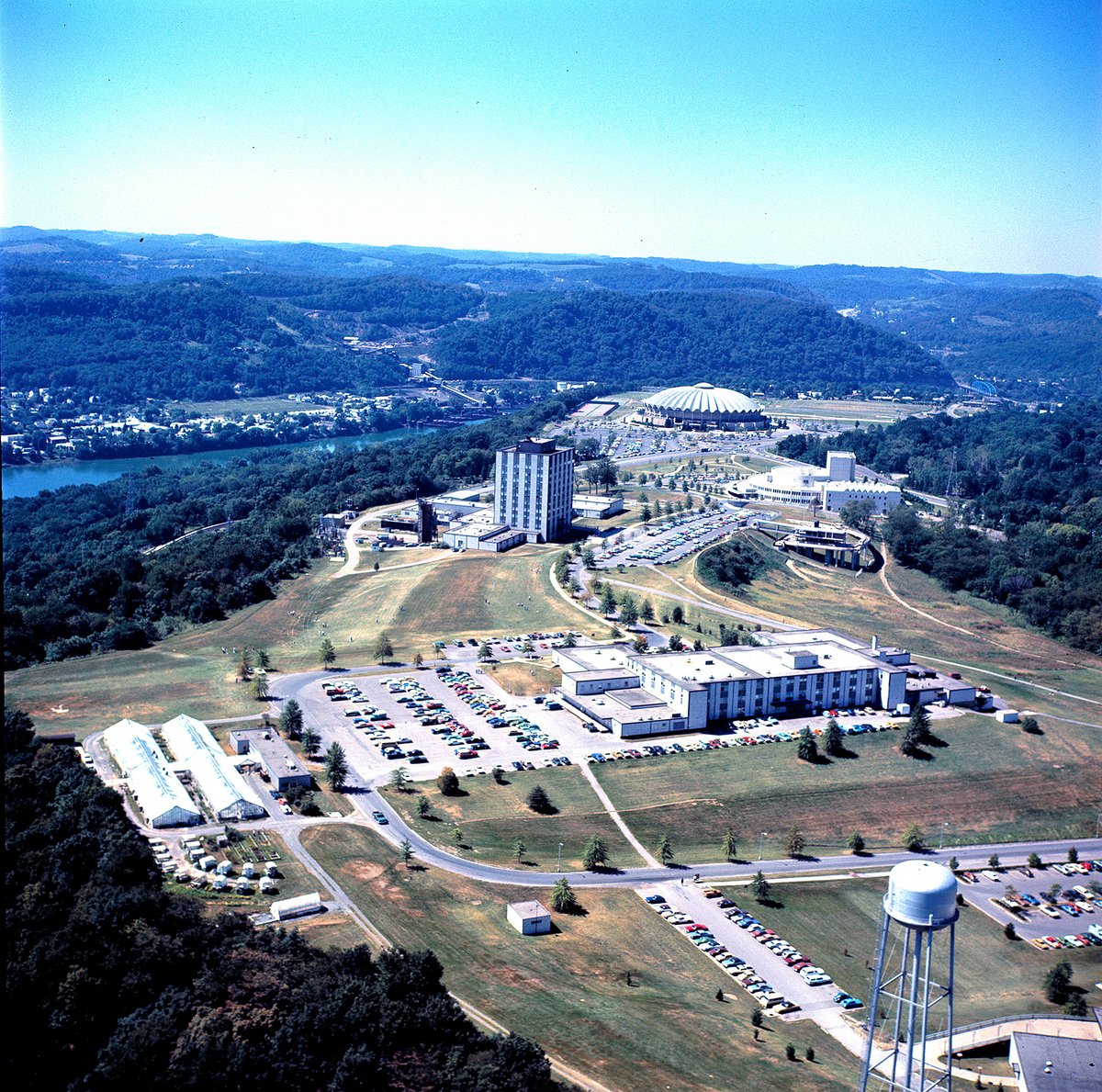 WestVirginiaU's tweet photo. Evansdale in the 1980s and now. 👀 https://t.co/DCmBgjz86z