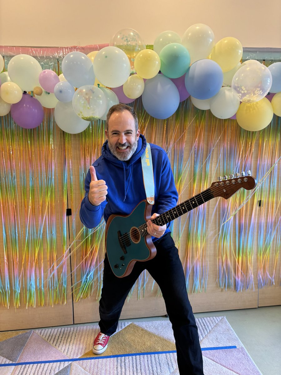 Having fun playing some preschool graduation events this week. We’re even performing our song we wrote together called the “Rainbow Train.” Plus, check out this fab backdrop!