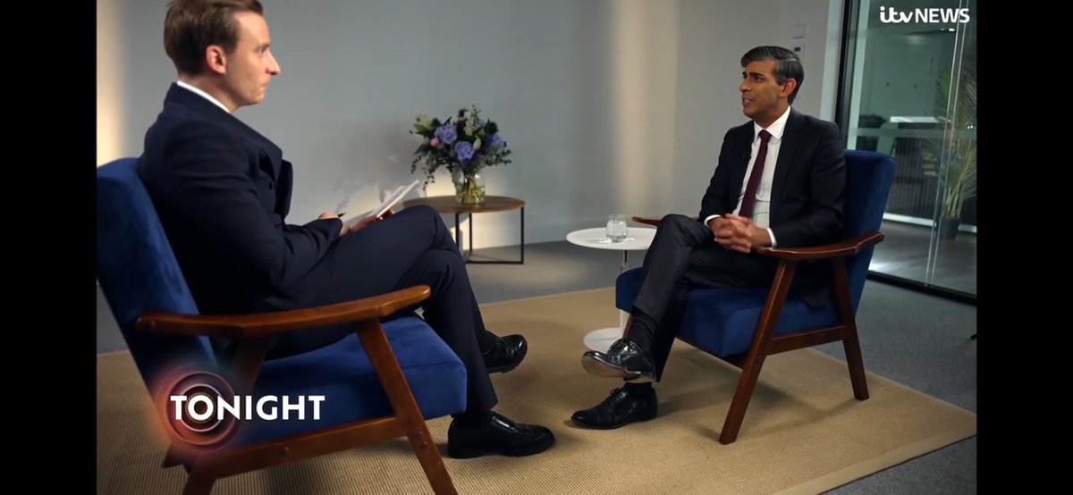Dr_SReshamwalla's tweet photo. I’m trying to figure out if they gave rishi sunak a smaller chair so he could mirror the (I assume) taller interviewer’s position? I’m a shortie and there’s no way I’d be able to cross my legs on that chair. https://t.co/RDboIF5x3F