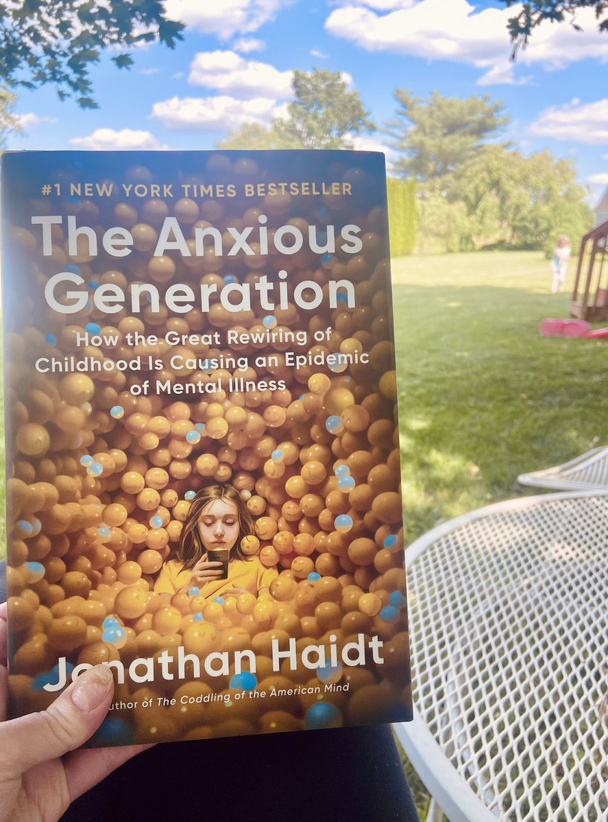 NATarteducator's tweet photo. Starting my summer book journey under my favorite tree with ‘The Anxious Generation’ by Jonathon Haidt. #mentalhealthawareness #bamsartroom #jana_marie_foundation #youmatter https://t.co/lolm87PXA7