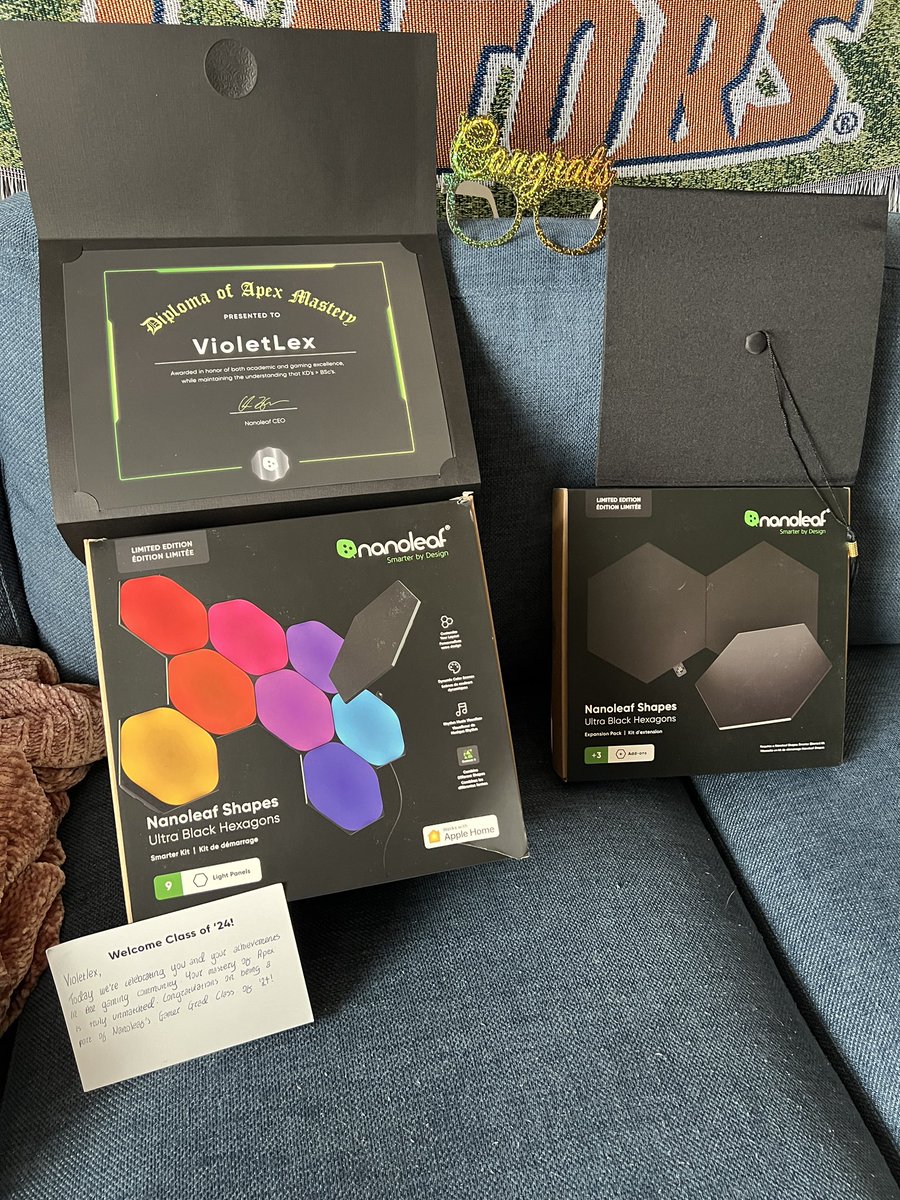 VioletLex's tweet photo. Huge shout out to @nanoleaf for sending me this graduation package!!!! I have a degree in @PlayApex Mastery now 🎓 it was so fun opening this on stream the other day 🥺 #gamergrad https://t.co/AjB7FQKWKm