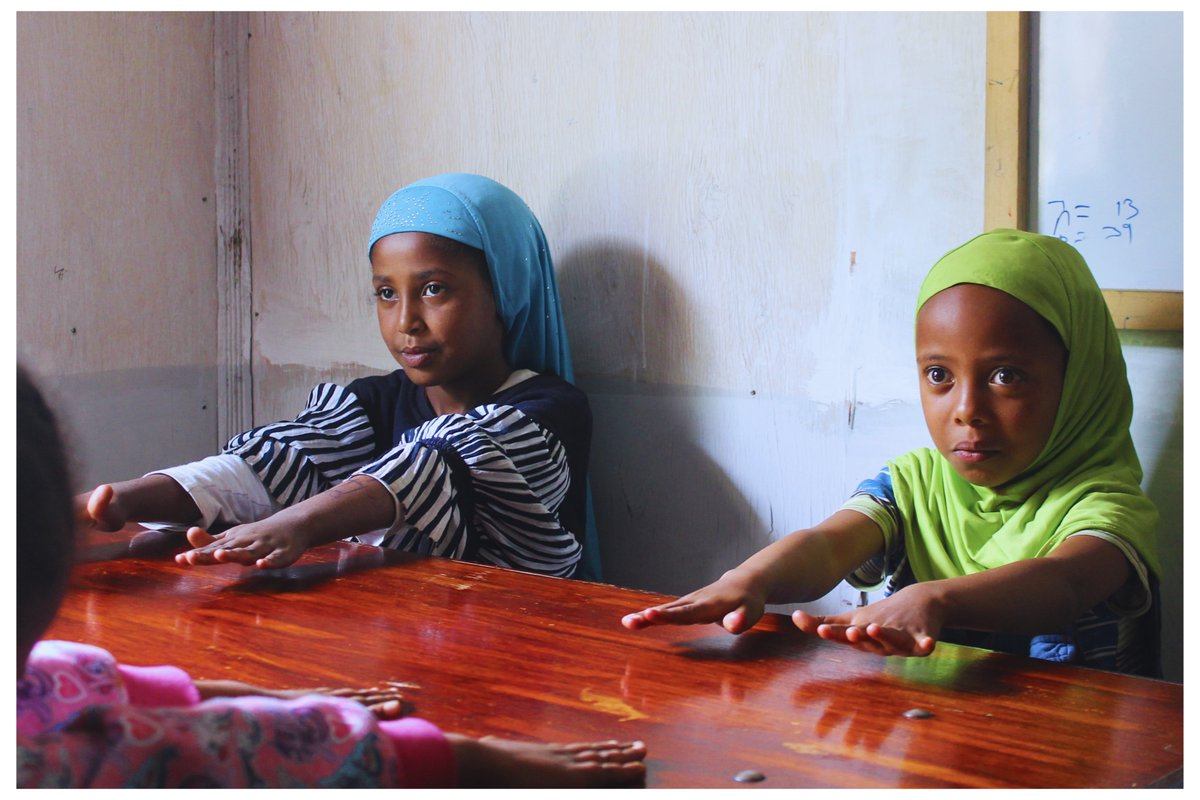 Ferdos and Hiba, pictured here, are  preparing for weekly art program that involves drawing and painting. The arts provide a safe and constructive outlet for children to express their emotions.  #CreativeExpression #PaintAndPlay #ArtfulLearning