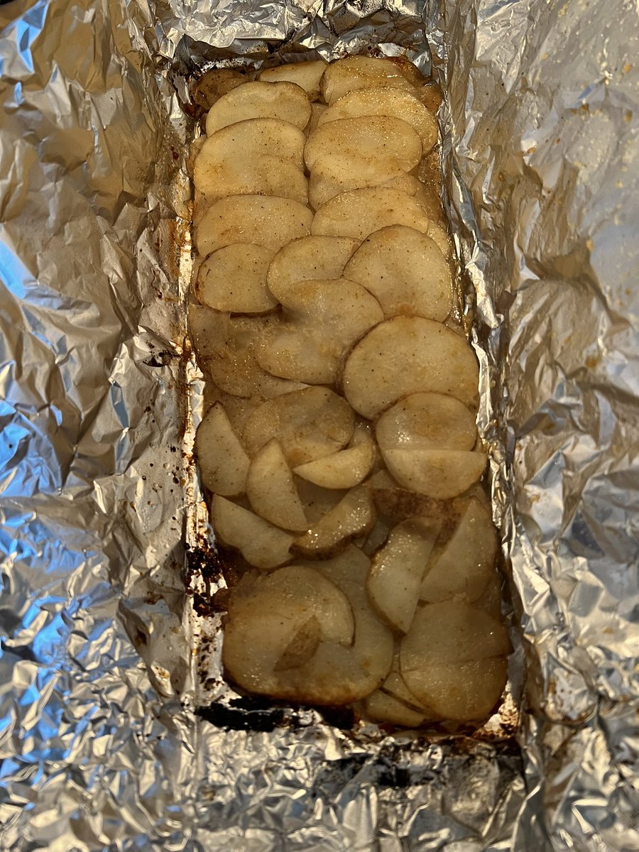 djdreier10's tweet photo. Chris let me cook on the grill tonight. I am quite proud with how these pork chops and taters turned out! #BBQ https://t.co/nmC4pEJ1te