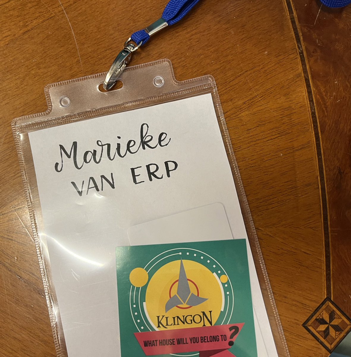 merpeltje's tweet photo. When your badge only has text on one side and keeps flipping over but your colleagueβs hobby is calligraphy π #ISWS2024 #CreativeBunch https://t.co/Oc6VCWlKby