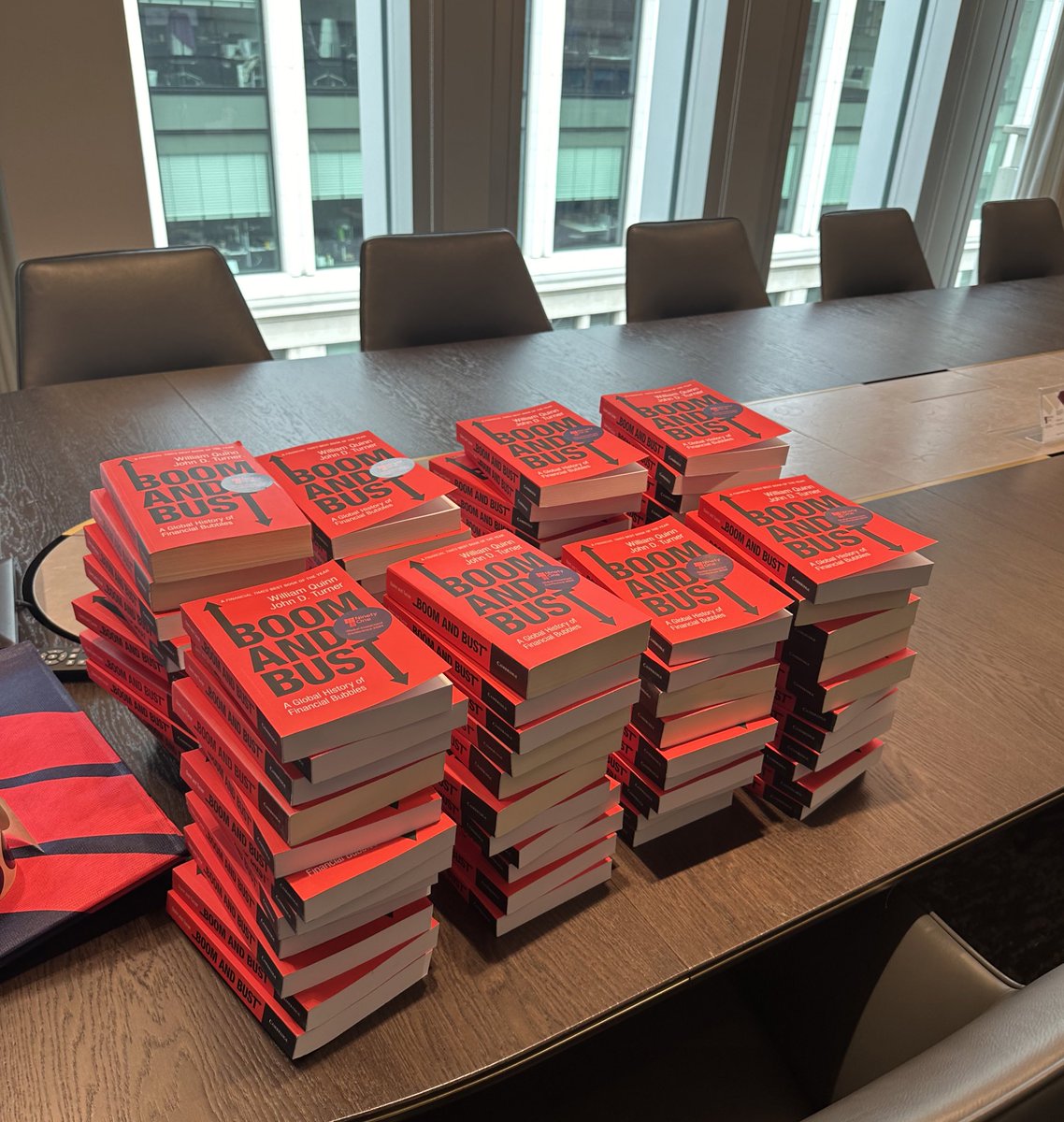 Signing 100 copies of <a href="/BoomBustBubbles/">Boom and Bust</a> for participants at the Ninety One Global Investment Conference!