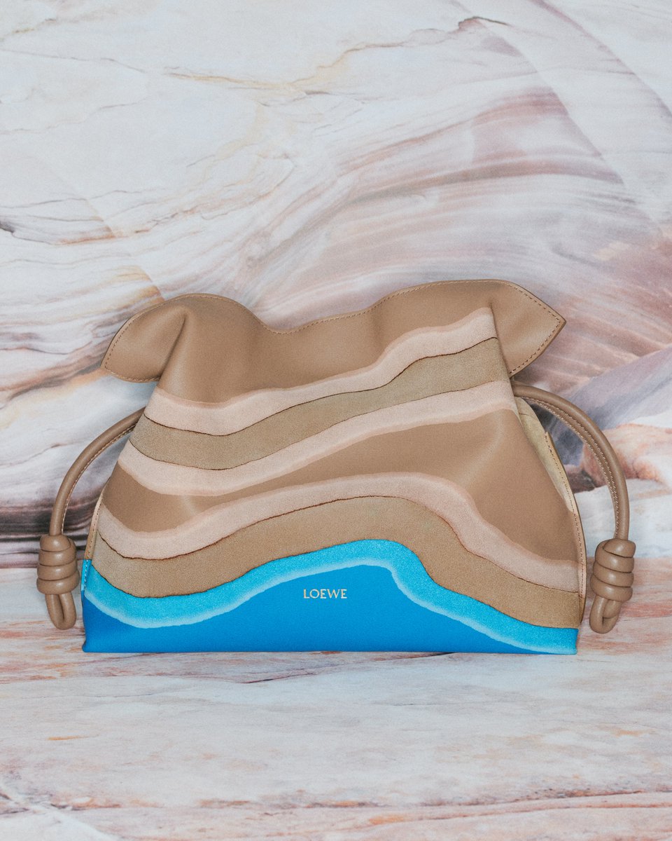 LoeweOfficial's tweet photo. Echoing the ancient horizons of Spain, the topographic design of our new Flamenco Surplus bag is the latest creation born out of our ongoing journey of sustainability.

Created as part of the LOEWE Surplus Project, the Flamenco Surplus bag has been (re)constructed out of leftover leather from previous collections—a product of innovative methods and re-thinking craft.

Exclusively available in selected stores.

Find out more: https://t.co/ULIzsqiBfb 

#LOEWE
