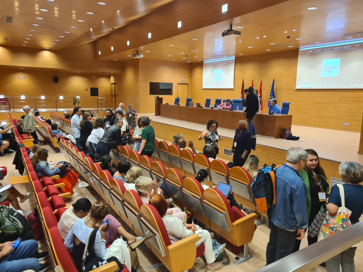 At the opening of the IASWG 2024 Symposium in Madrid: Breaking Barriers: Groupwork and Social Justice. Symposium going well: positive, lively and interesting as ever