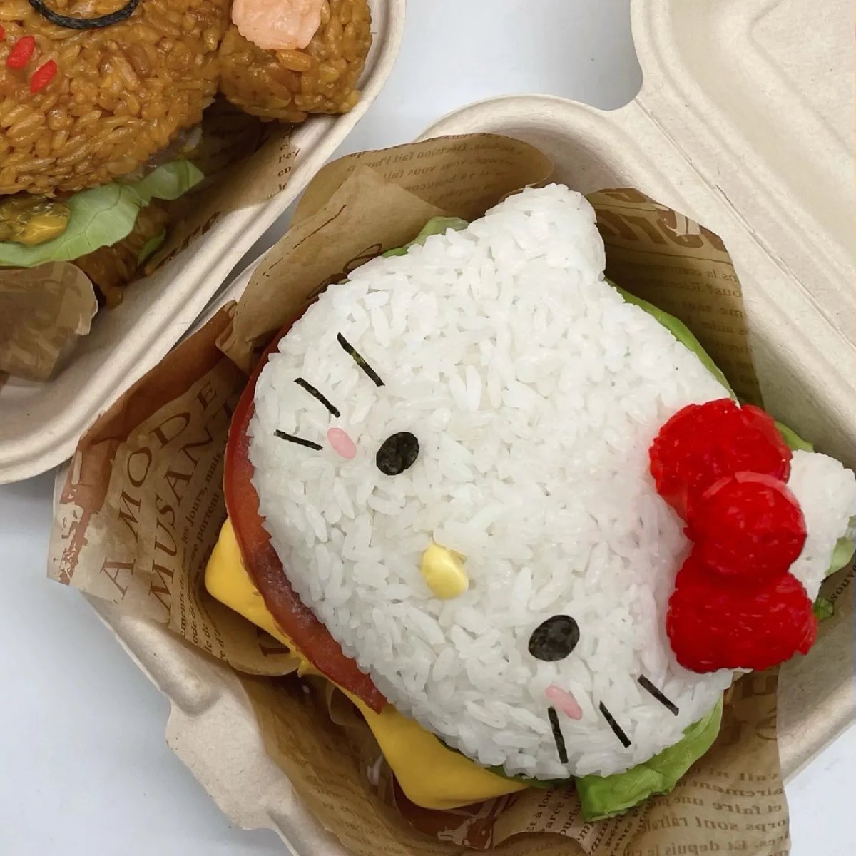 sanriodaily's tweet photo. hello kitty rice burger 💫 https://t.co/clMQ96wLEk
