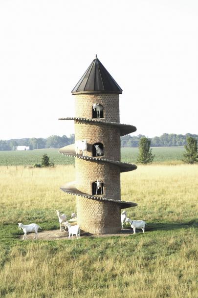 FarmShow's tweet photo. "Goats love it and people driving by can't believe it," says David Johnson of Findlay, Ill., about his 31-ft. tall, 7-ft. dia. "goat tower" built with the help of the late Jack Cloe, Herrick, Ill. #goattower #goats #handmadebricks #throwbackthursday https://t.co/hE0JKZ6bg2 https://t.co/YrtVazHrH7