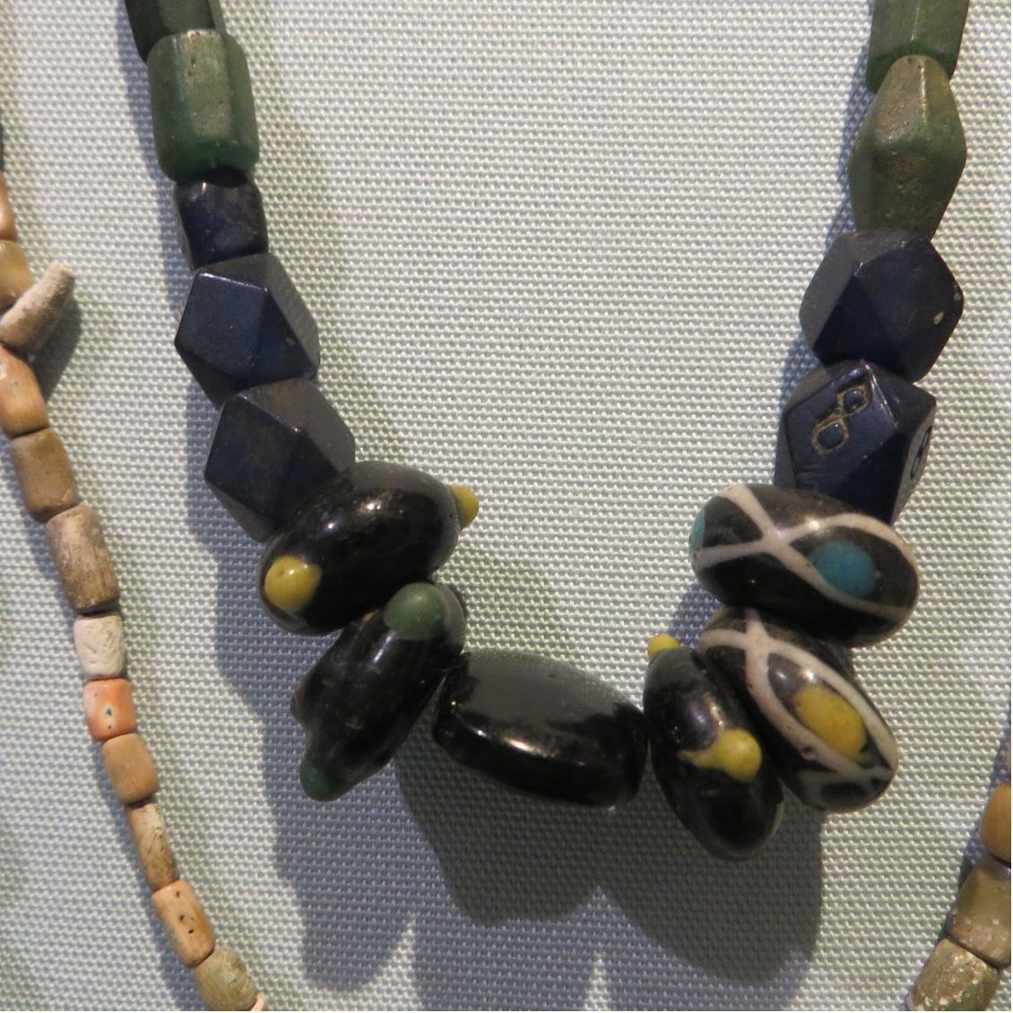 The latest from Prof Swift's research project on ancient British hoards: 
These items are from the Icklingham hoard in the Museum of Archaeology and Anthropology, Cambridge. Were 'cornerless cube' glass beads valuable enough to hoard with gold and silver?
buff.ly/4en3iI8