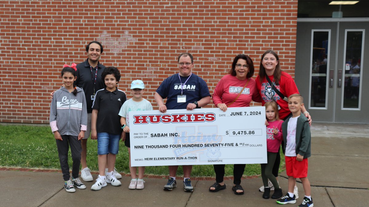 Heim students kicked off Super Fun Day last Friday with a run-a-thon donation to SABAH!
