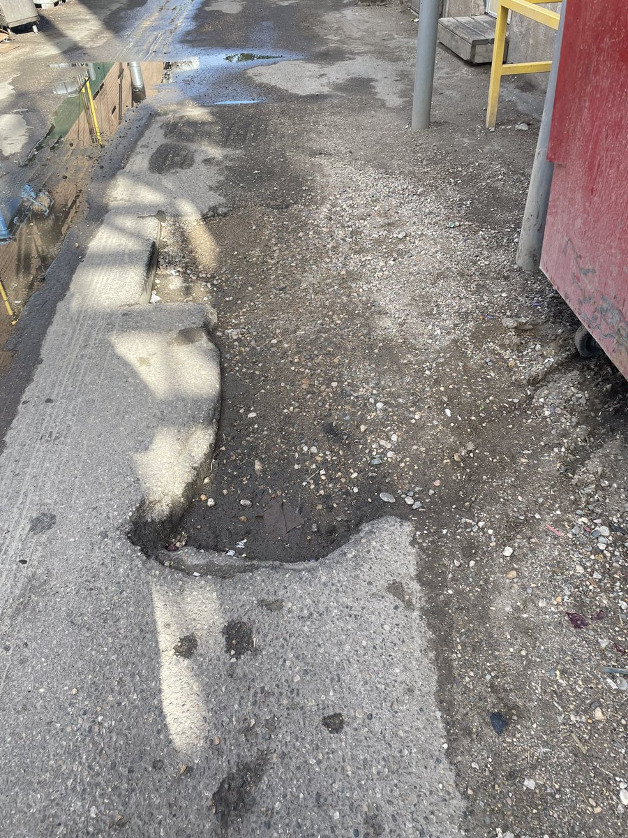 PBenitez77's tweet photo. @cityofsaskatoon In the Past 4 weeks I’ve probably seen 10 cats tires pop just from this huge pot hole in alley behind Tavernas not sure if you guys flip the bill on those tires just a heads up https://t.co/Wk6AaonKnJ