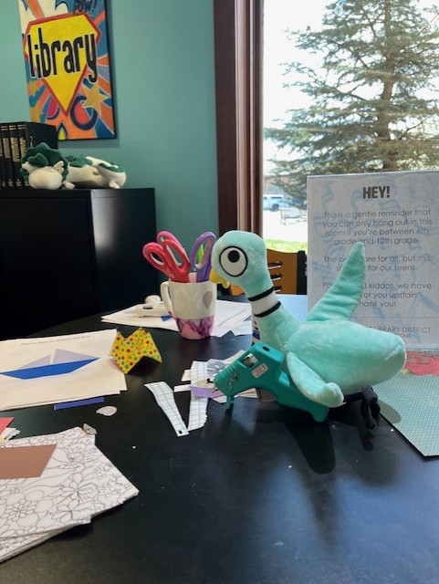 codepted's tweet photo. At Rampart Library District, @The_Pigeon tried on a new pair of wings &amp; crashed the habitat where Waffles, the library’s bearded dragon, lives. The Pigeon also used the library craft area to build a stage curtain for an Oscar-worthy performance with Fireman Gobble. https://t.co/ojvUYBoFLl