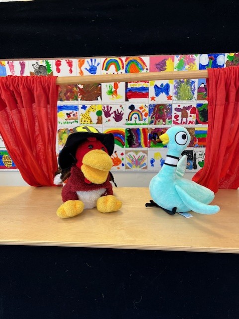 At Rampart Library District, <a href="/The_Pigeon/">The Pigeon</a> tried on a new pair of wings &amp; crashed the habitat where Waffles, the library’s bearded dragon, lives. The Pigeon also used the library craft area to build a stage curtain for an Oscar-worthy performance with Fireman Gobble.