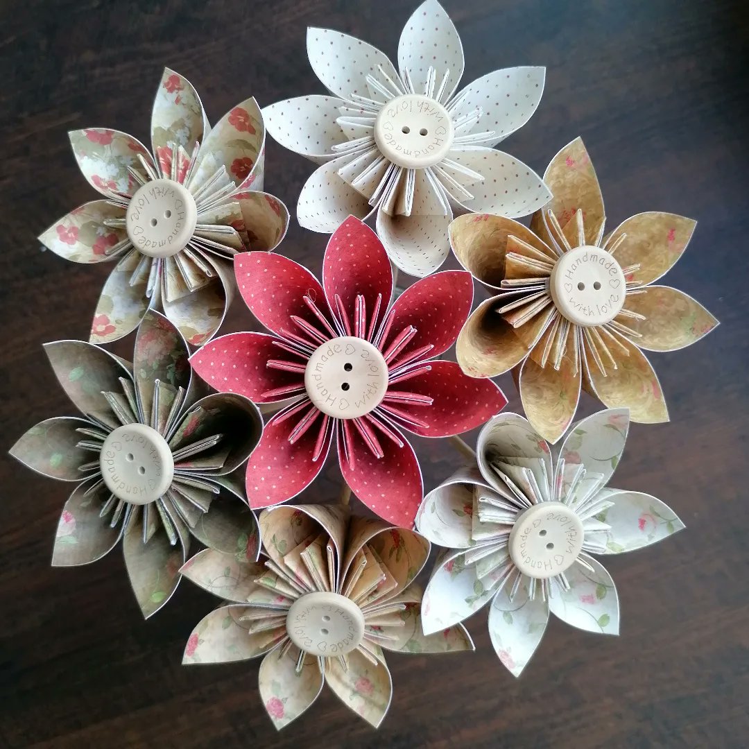 Beautiful neutrals with a pop of pink on this Kusudama bouquet.
7 flowers each on a bamboo stem with a button centre.
Approx Height is 30cms but can easily be shortened if required.

£14.00 plus £4.00 postage