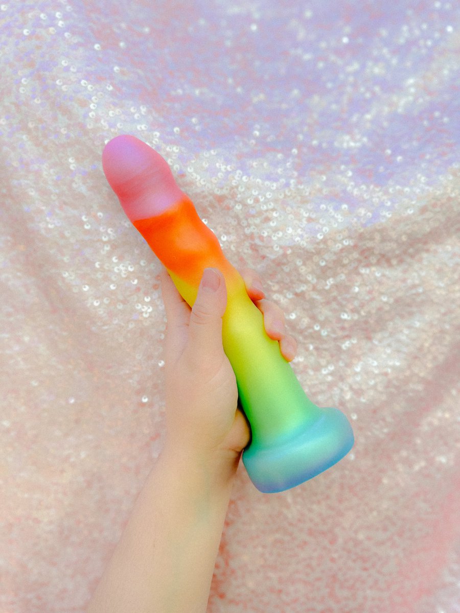 The Tower in pride colors! It’s extra gay because my ex is the hand model 🌈