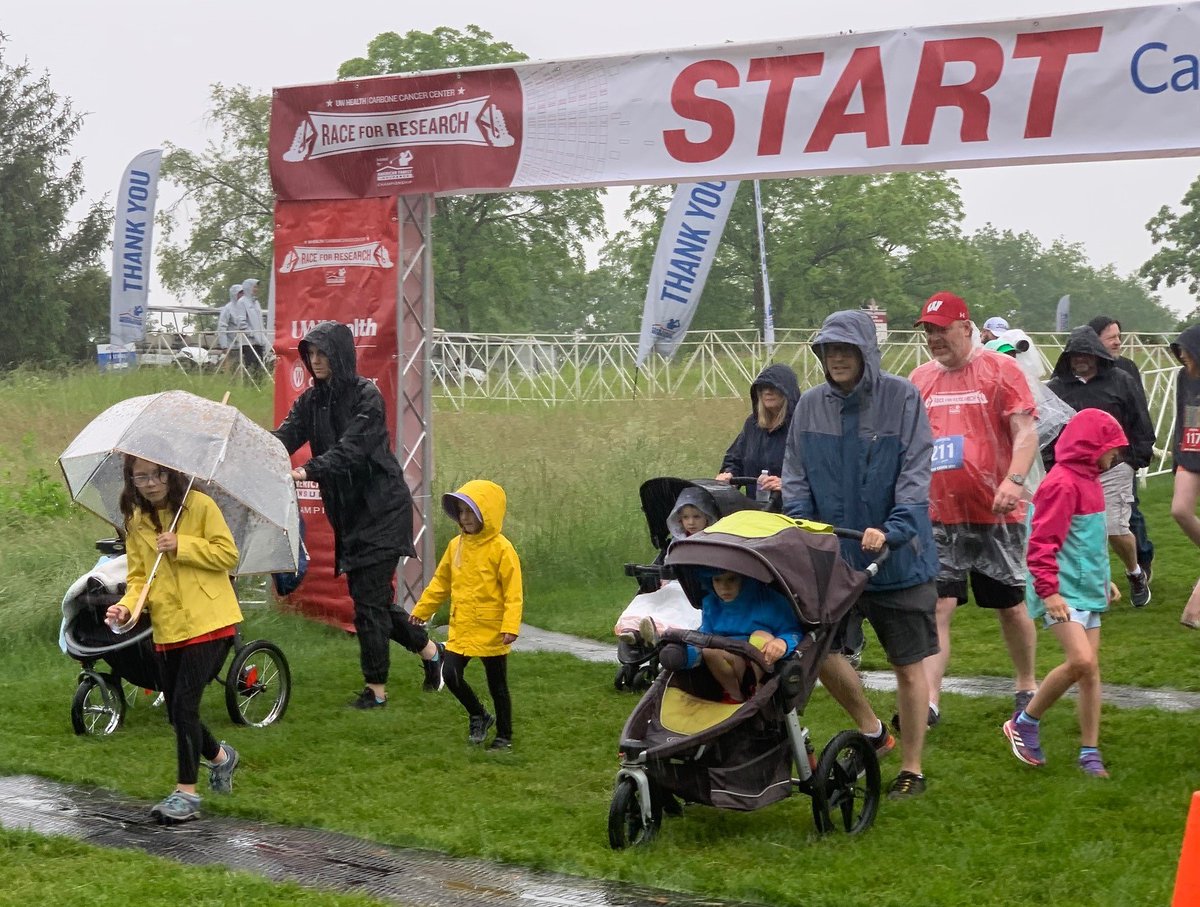 AmFamNews's tweet photo. First event of @AmFamChamp week, the @UWCarbone #RaceforResearch! A little rain (well a lot of rain!) didn't deter these runners/walkers from raising money for cancer research today! https://t.co/B55M8EsyRD