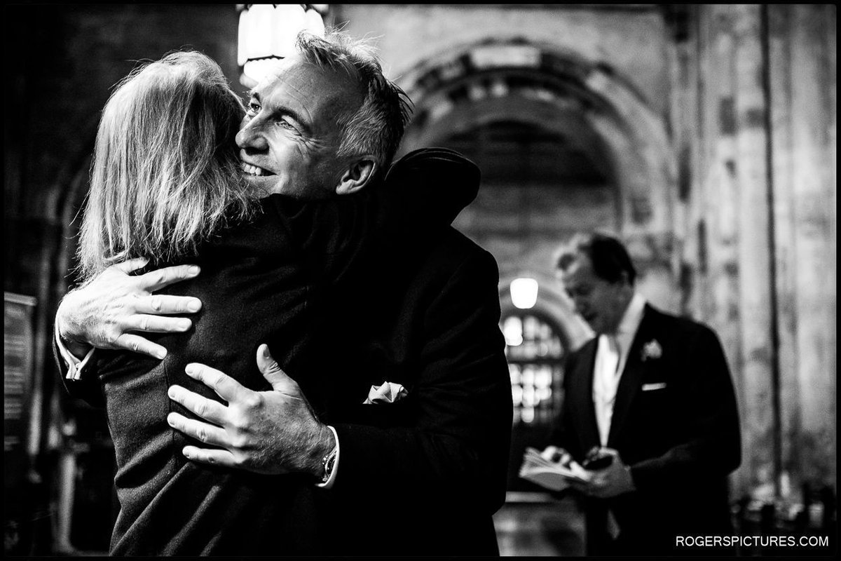 Nick greeting guests before marrying Aki at St Bartholomew the Great in London
rogerspictures.com/church-wedding…
