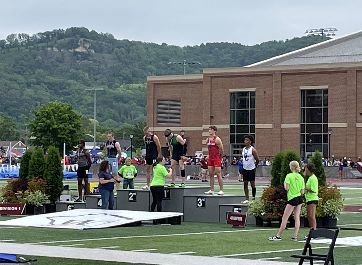 Hard to tell from across 10 lanes of track but that is Janesville Parker’s Cayden Brandenburg receiving his winner’s medal after the Division 1 boys 400-meter dash. His time was 47.77 and he’s got two races left to go, the 200 and the 1,600 relay. <a href="/PHS_BoysTrack/">Parker High School T&F</a> <a href="/AthleticsParker/">Parker Viking Athletics & Activities</a>